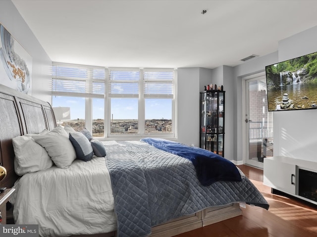 bedroom featuring wood-type flooring