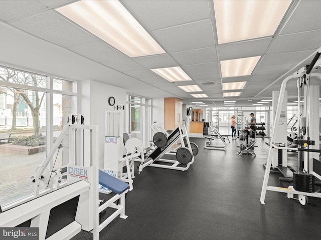 gym with a drop ceiling