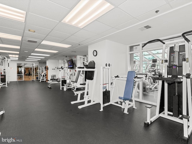 gym with a drop ceiling