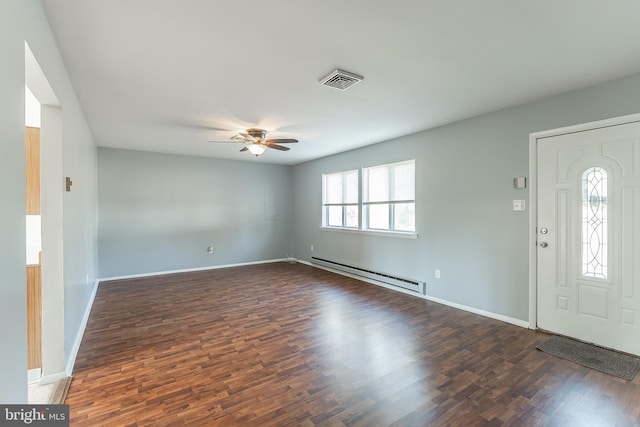 foyer with ceiling fan, dark wood-type flooring, and a baseboard radiator