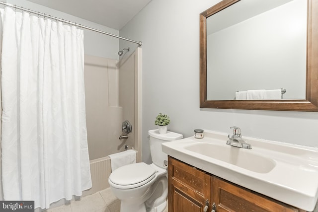 full bathroom featuring tile patterned floors, vanity, shower / bath combo, and toilet