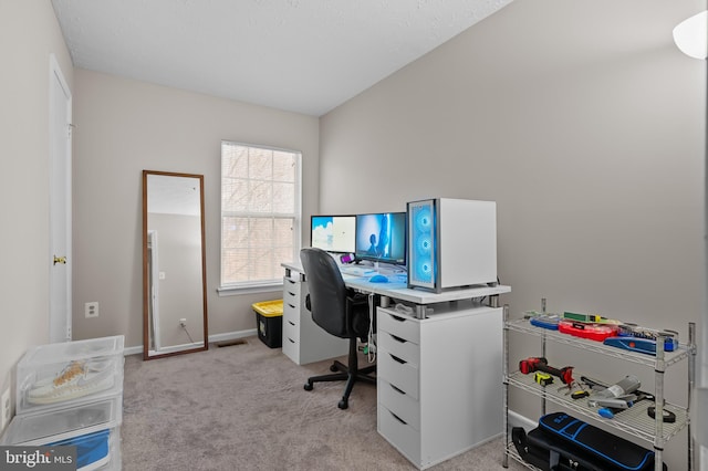 office with carpet flooring and baseboards