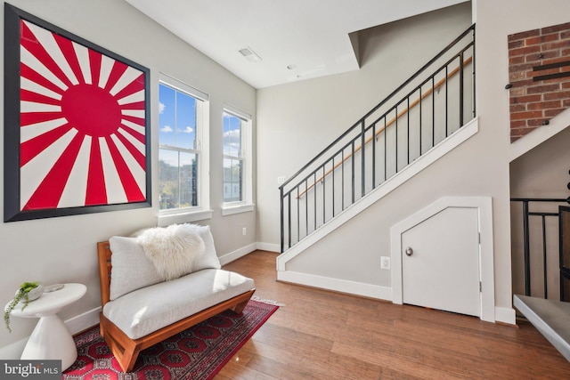 sitting room featuring hardwood / wood-style flooring