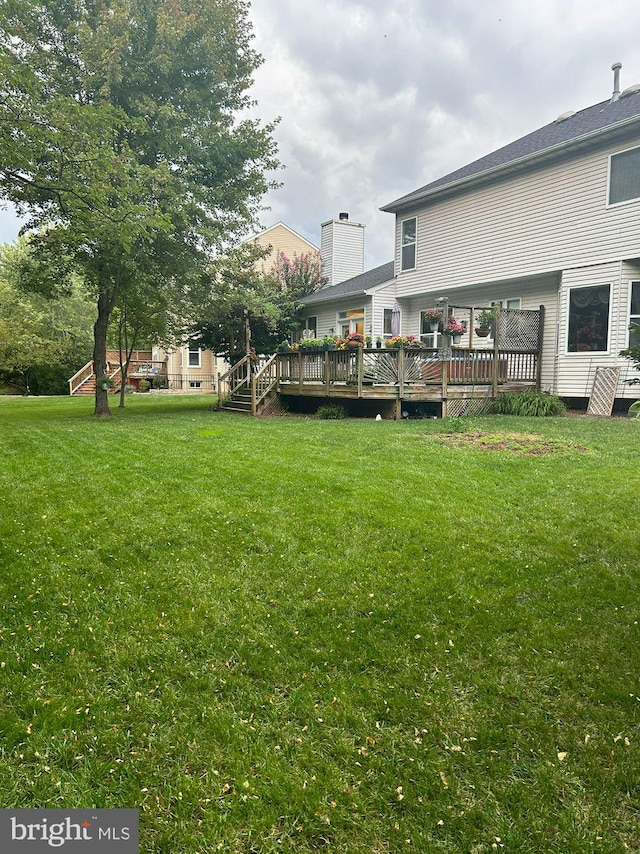 view of yard featuring a deck