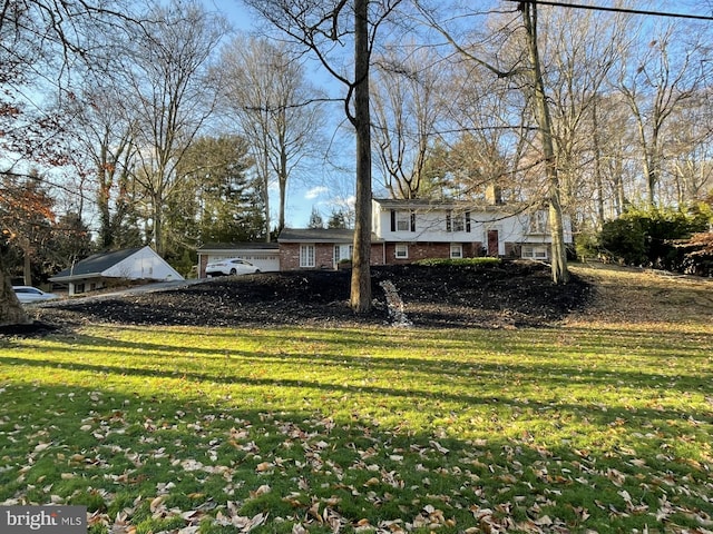 view of front of home with a front yard