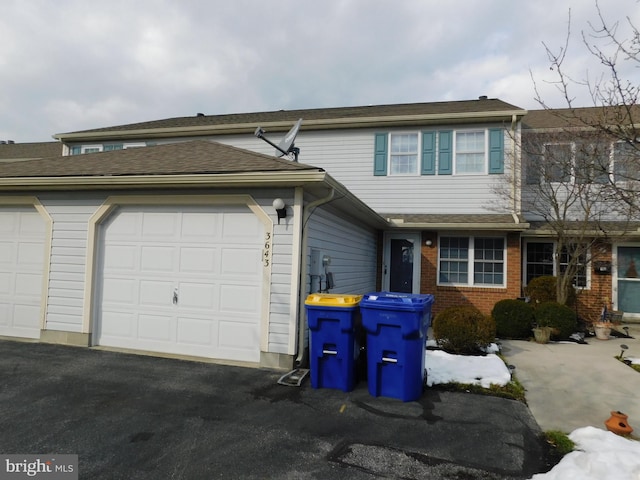 view of property featuring a garage