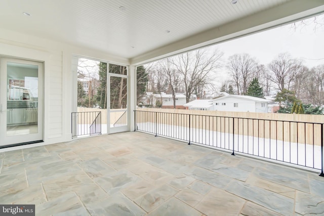 view of unfurnished sunroom