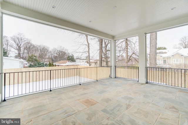 view of unfurnished sunroom