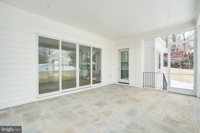 view of unfurnished sunroom