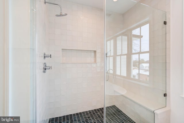 bathroom featuring an enclosed shower