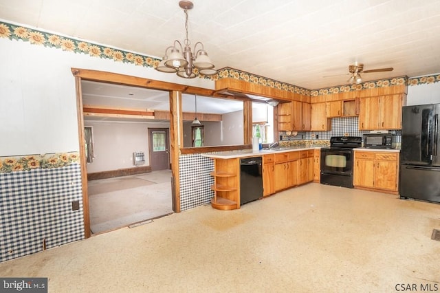 kitchen with backsplash, black appliances, ceiling fan with notable chandelier, decorative light fixtures, and kitchen peninsula