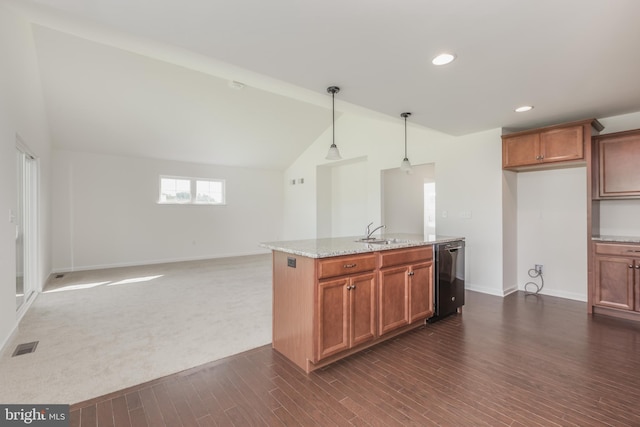 kitchen featuring light stone countertops, dark wood-type flooring, dishwasher, hanging light fixtures, and sink