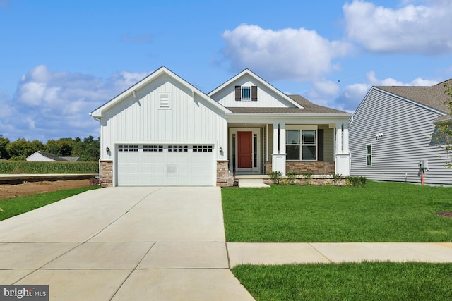 craftsman inspired home with a garage and a front yard