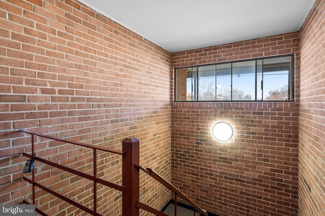 interior space with brick wall