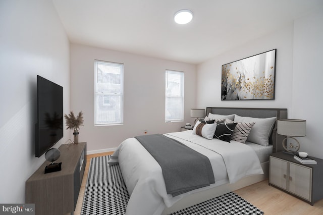 bedroom featuring light wood-type flooring