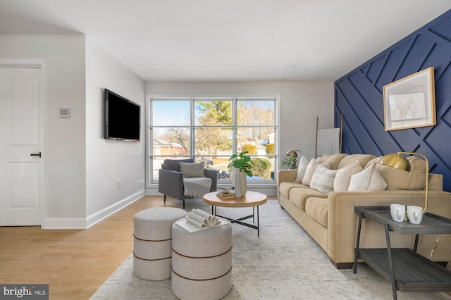 living room with light hardwood / wood-style floors