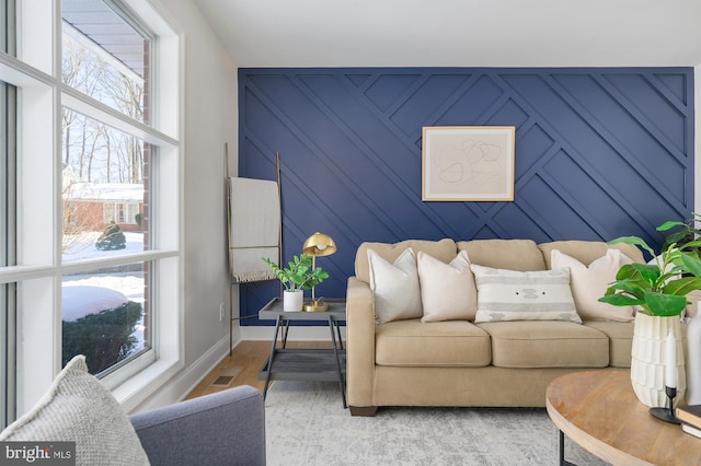 living room with light hardwood / wood-style floors