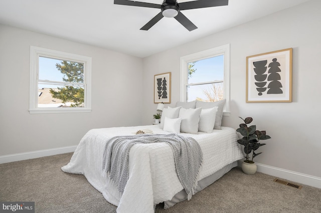 bedroom featuring ceiling fan and carpet floors