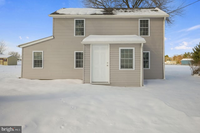 view of snow covered house