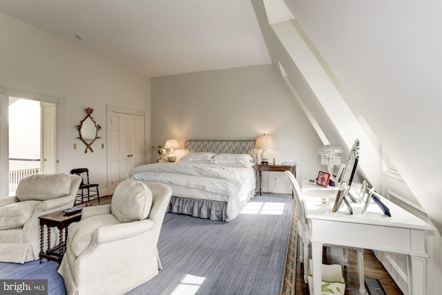 bedroom with lofted ceiling