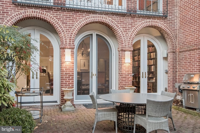 view of patio featuring a grill and french doors