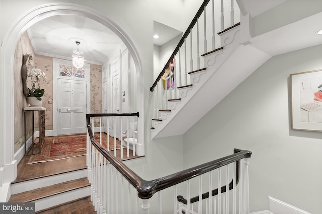 stairs with crown molding