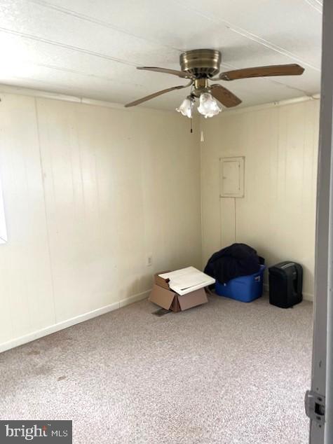 carpeted empty room with ceiling fan