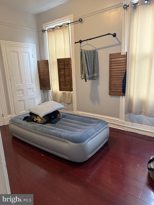 bedroom featuring hardwood / wood-style flooring