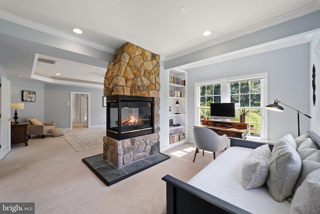 carpeted living room featuring built in features, a fireplace, and ornamental molding