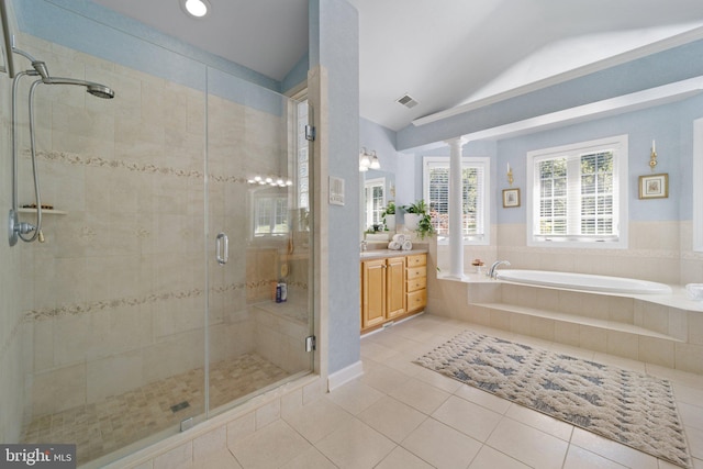 bathroom with lofted ceiling, vanity, separate shower and tub, and tile patterned flooring