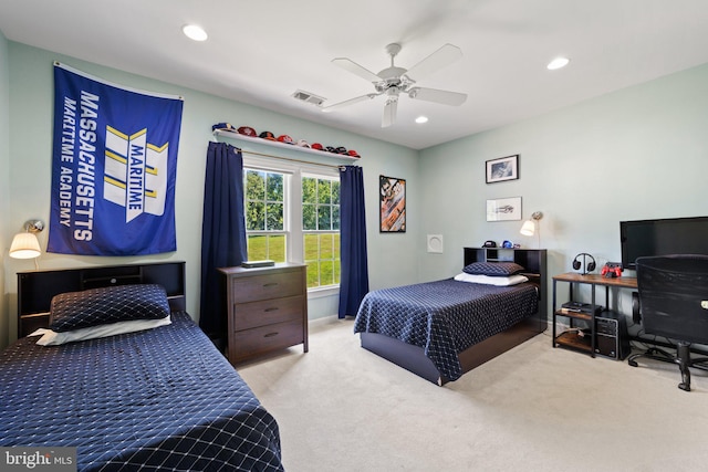 carpeted bedroom with ceiling fan