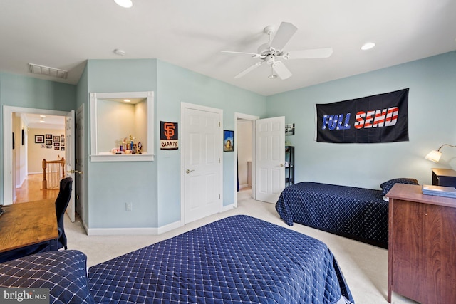 bedroom with light colored carpet and ceiling fan