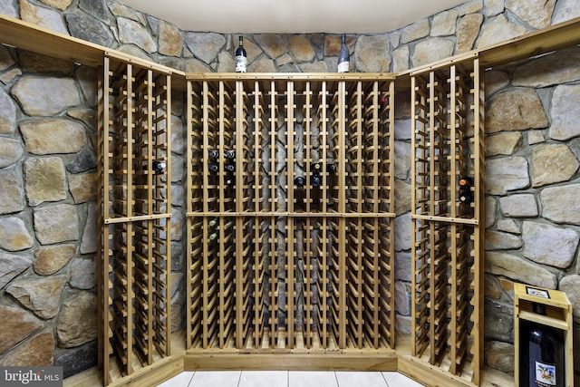 wine cellar with tile patterned flooring