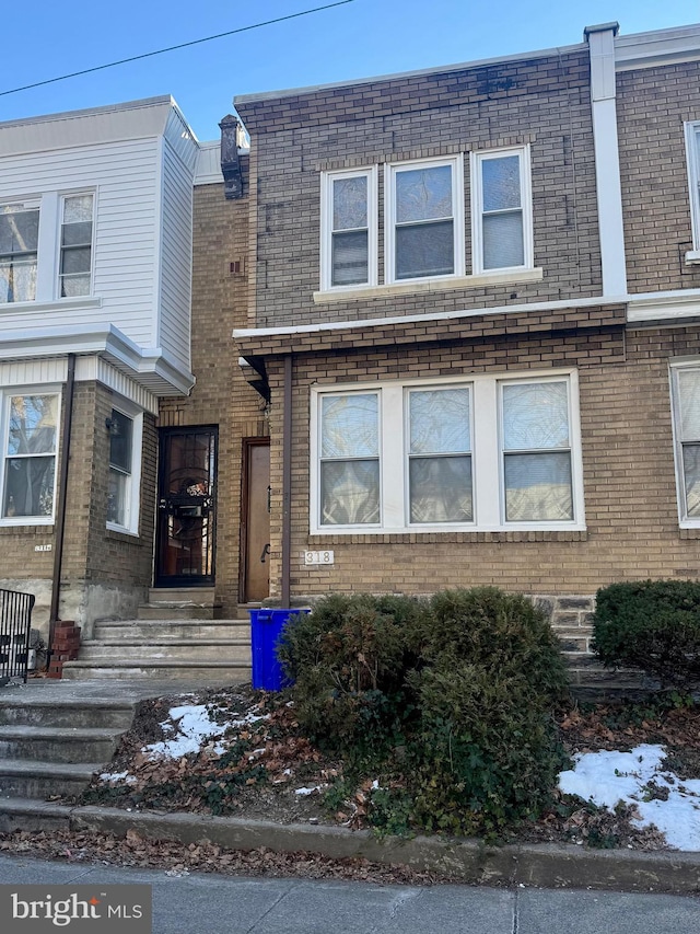 view of front facade with brick siding