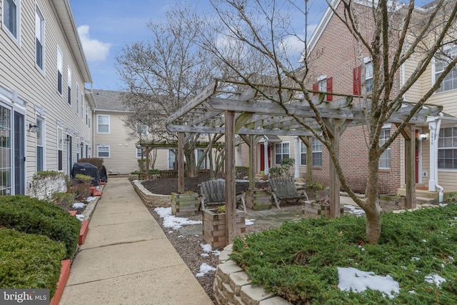 view of property's community with a pergola