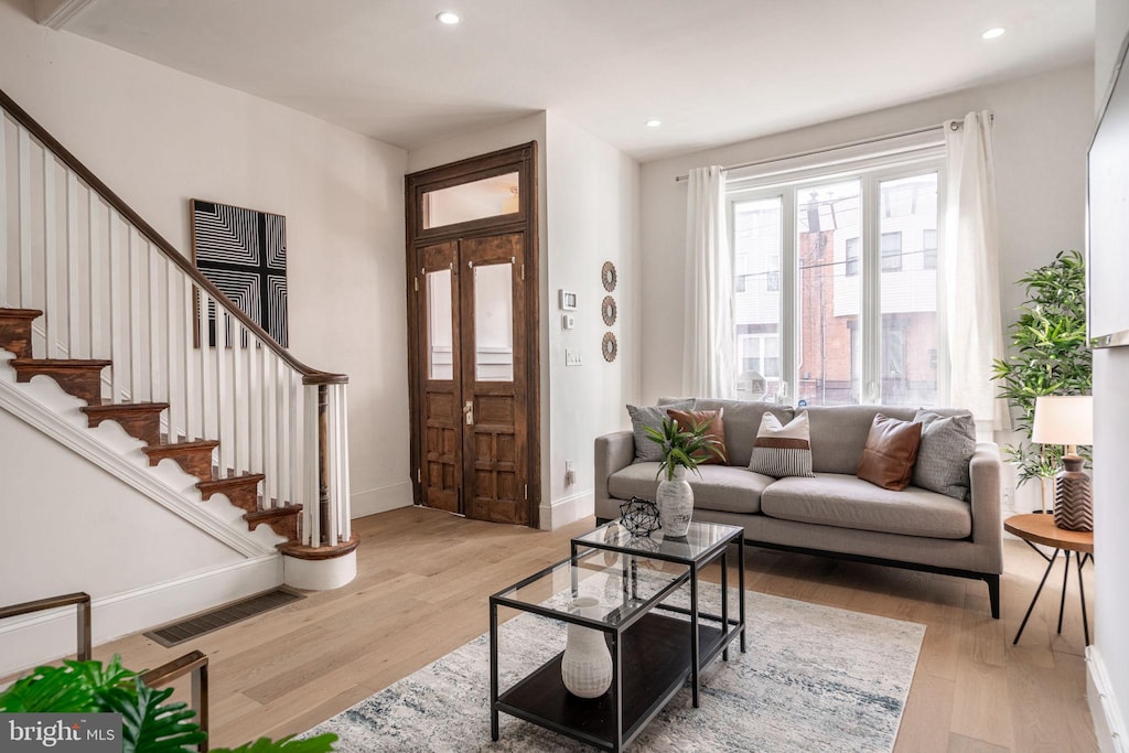 living room featuring light wood-type flooring