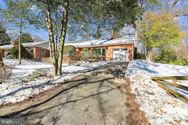 ranch-style home with a garage