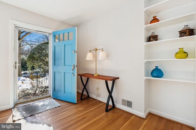 foyer entrance featuring light hardwood / wood-style floors