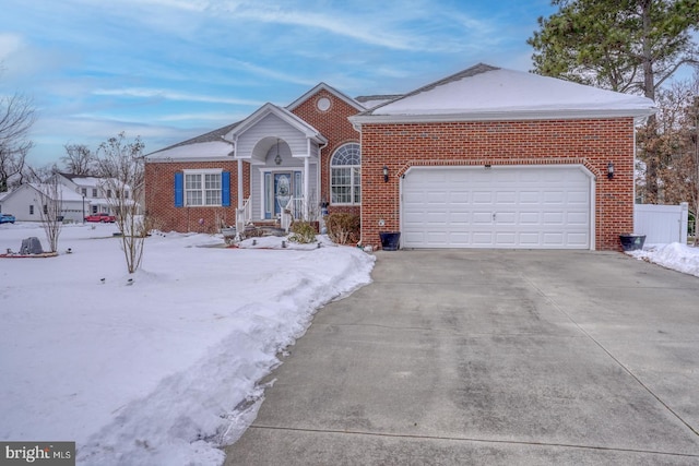 view of front of property with a garage