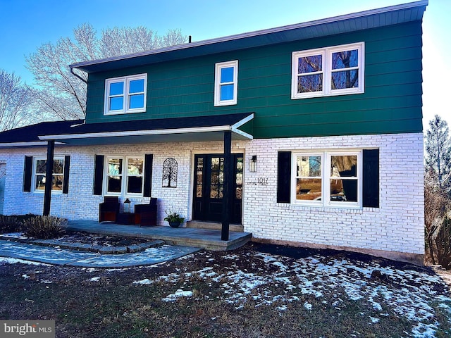 front facade featuring covered porch