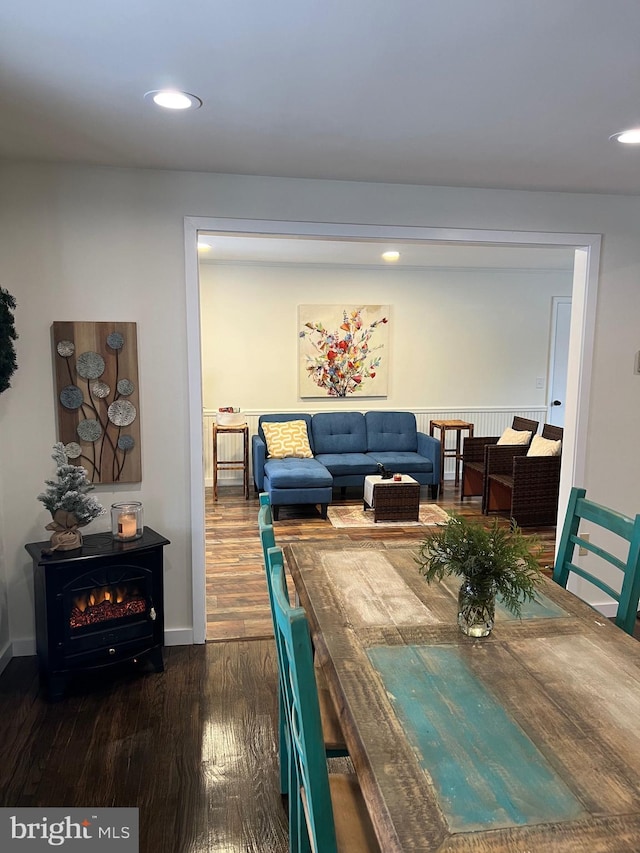 dining room with dark hardwood / wood-style flooring