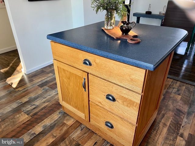 details with hardwood / wood-style flooring