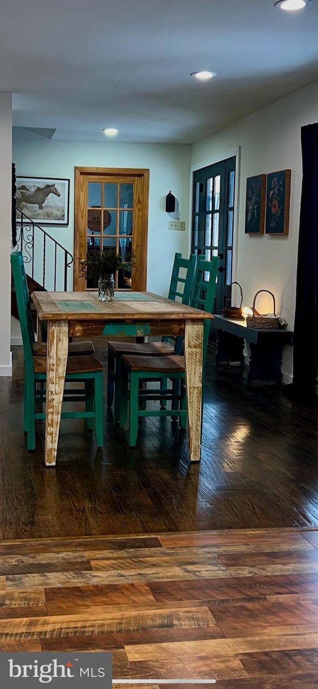 dining area with hardwood / wood-style flooring