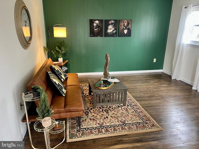 living area with dark hardwood / wood-style floors