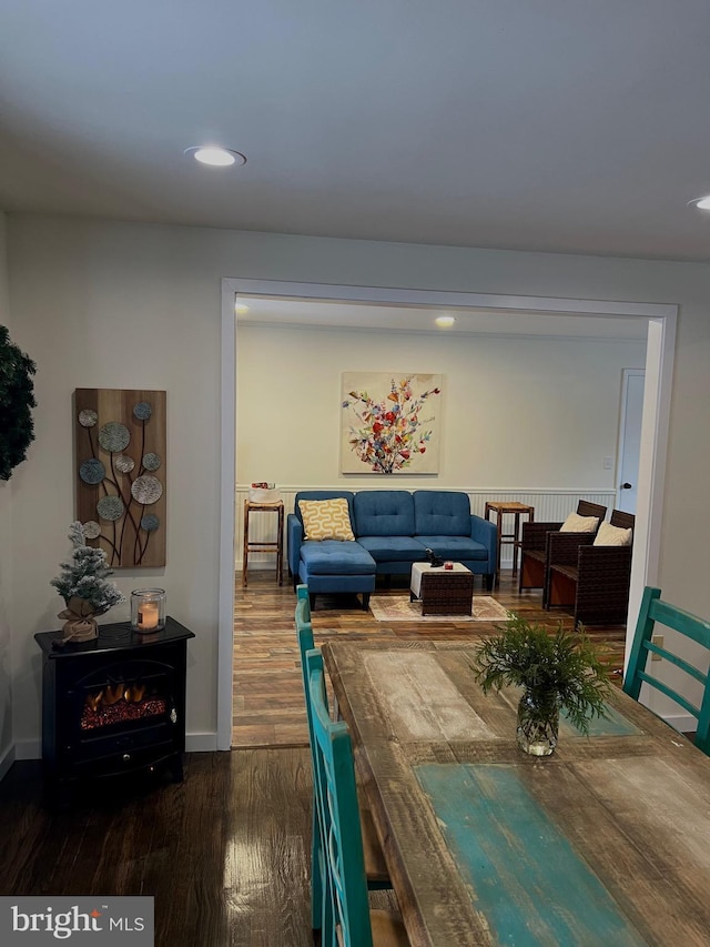 dining space featuring dark wood-type flooring