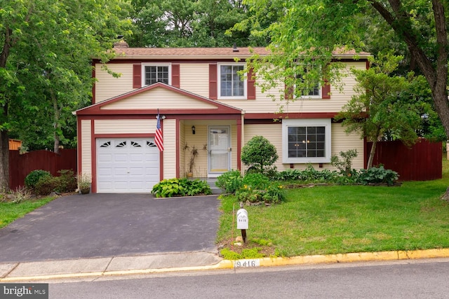9416 Mirror Pond Dr, Fairfax, VA 22032 - view of front of property featuring driveway, an attached garage, and a chimney