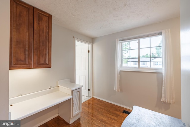 9416 Mirror Pond Dr, Fairfax, VA 22032 - bathroom featuring wood finished floors and a textured ceiling