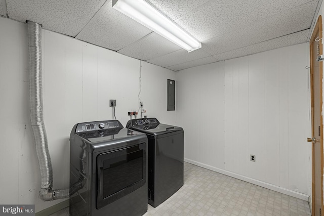 9416 Mirror Pond Dr, Fairfax, VA 22032 - laundry area with washer and clothes dryer, light floors, and electric panel