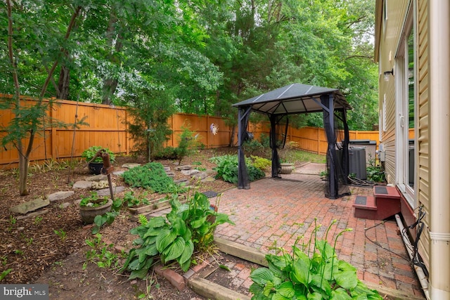 9416 Mirror Pond Dr, Fairfax, VA 22032 - fenced backyard featuring a gazebo and a patio