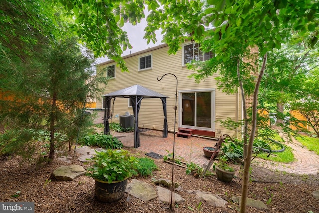 9416 Mirror Pond Dr, Fairfax, VA 22032 - back of house with a gazebo and a patio